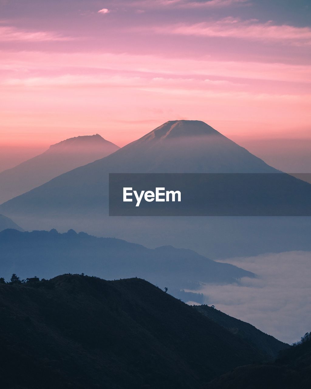 Scenic view of mountain against sky during sunset