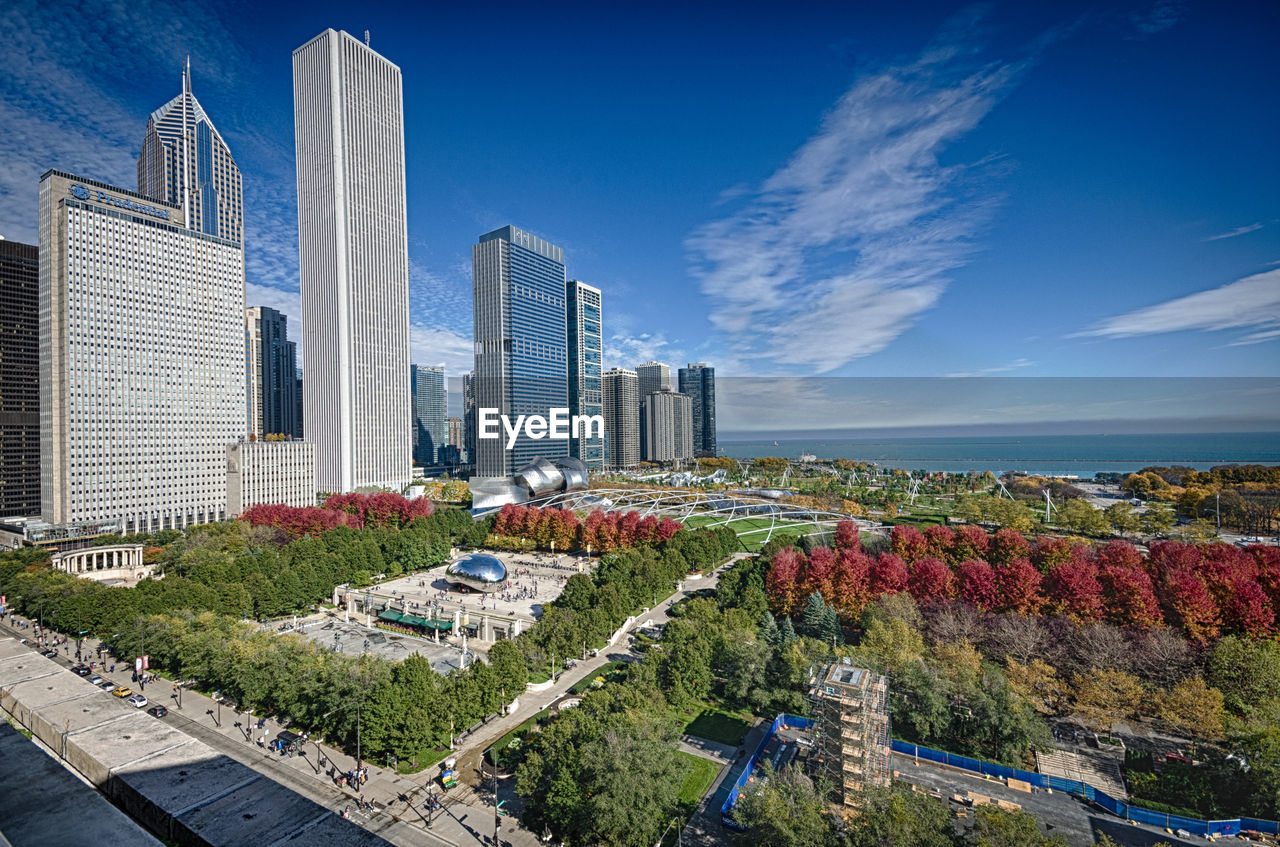 Modern cityscape against blue sky