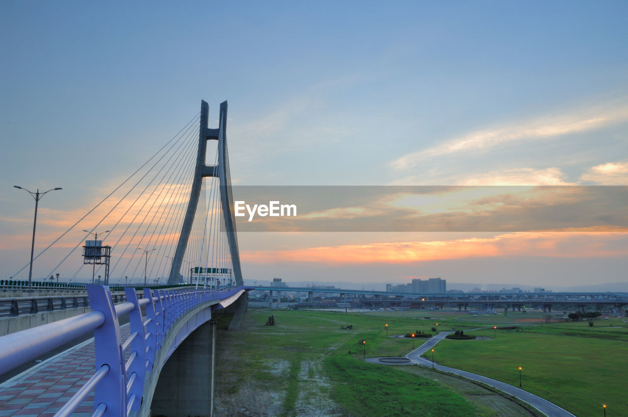 BRIDGE OVER ROAD IN CITY