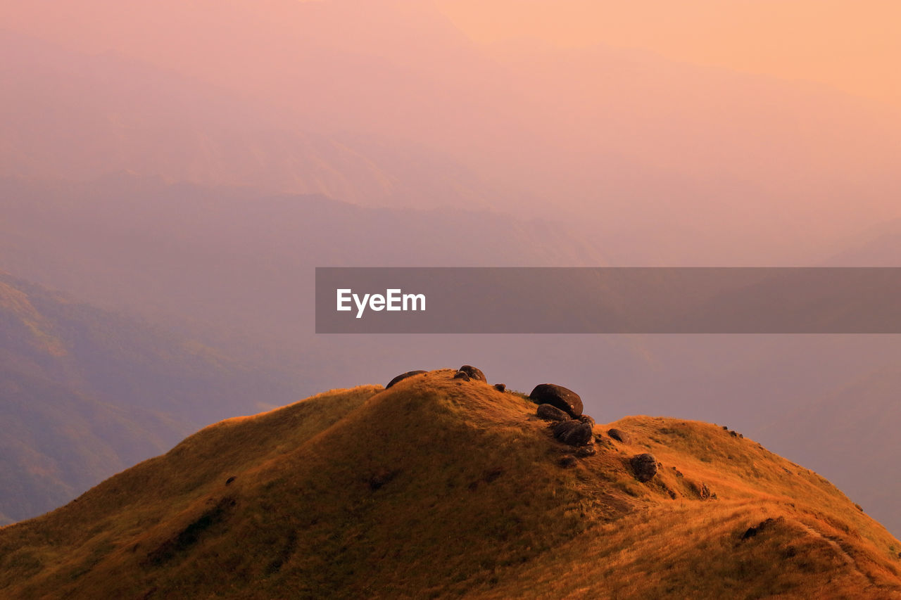 Scenic view of rocky mountains against sky