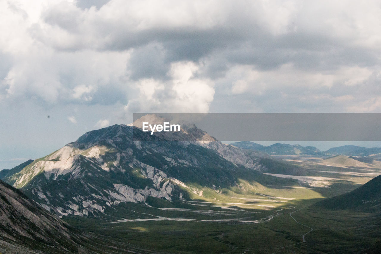 Scenic view of mountains against sky