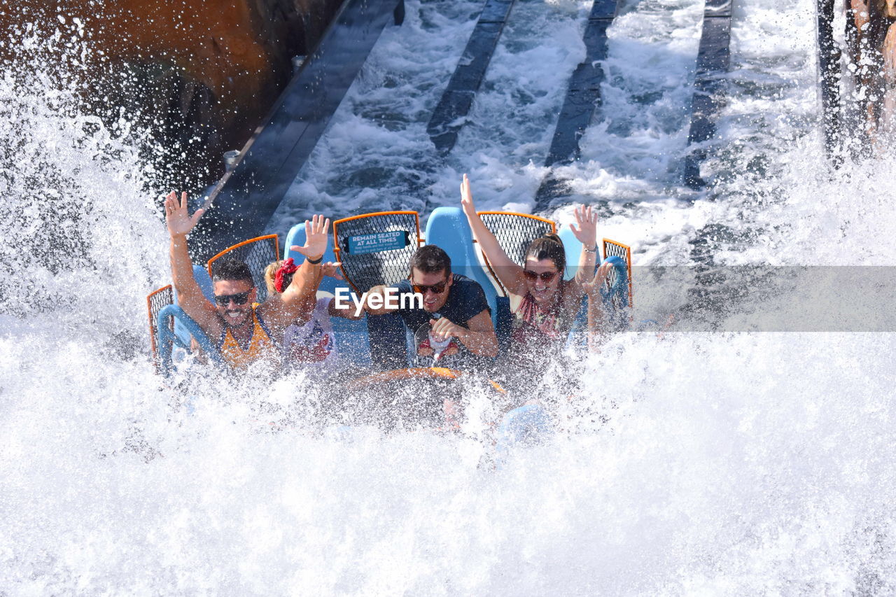 PEOPLE ENJOYING IN WATER