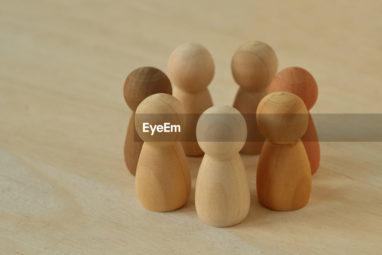 wood, indoors, no people, still life, close-up, table, group of objects, brown, food, toy, studio shot, simplicity