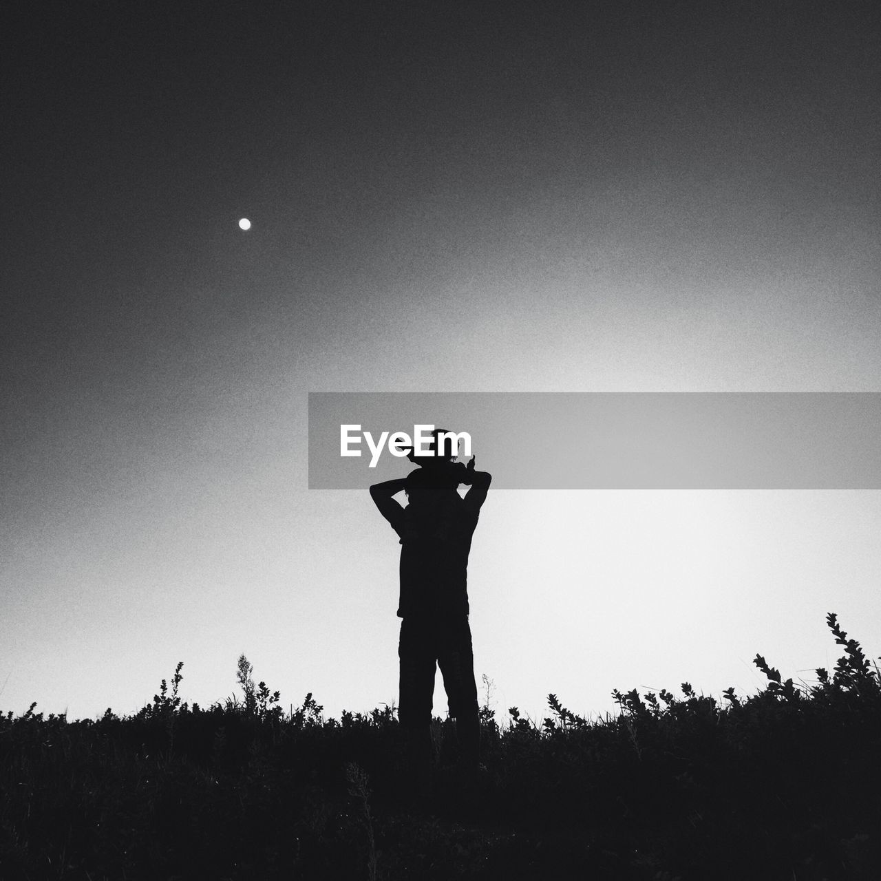 SILHOUETTE OF YOUNG MAN