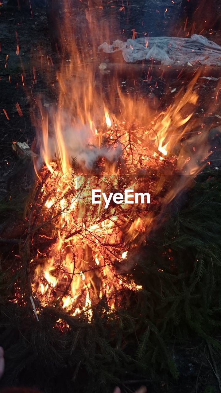 High angle view of bonfire at dusk