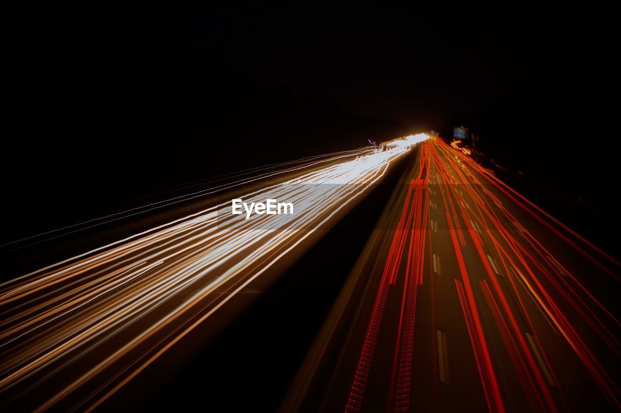 Light trails on road at night