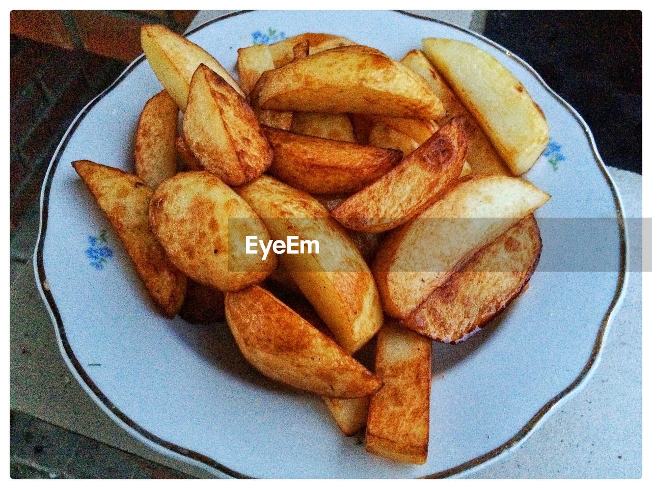 High angle view of fried potatoes in plate