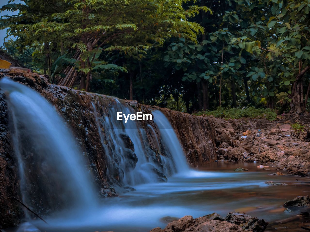 SCENIC VIEW OF WATERFALL