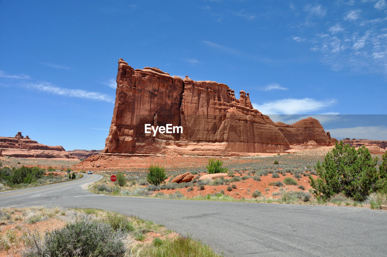 Road and rocky mountains at arches national park