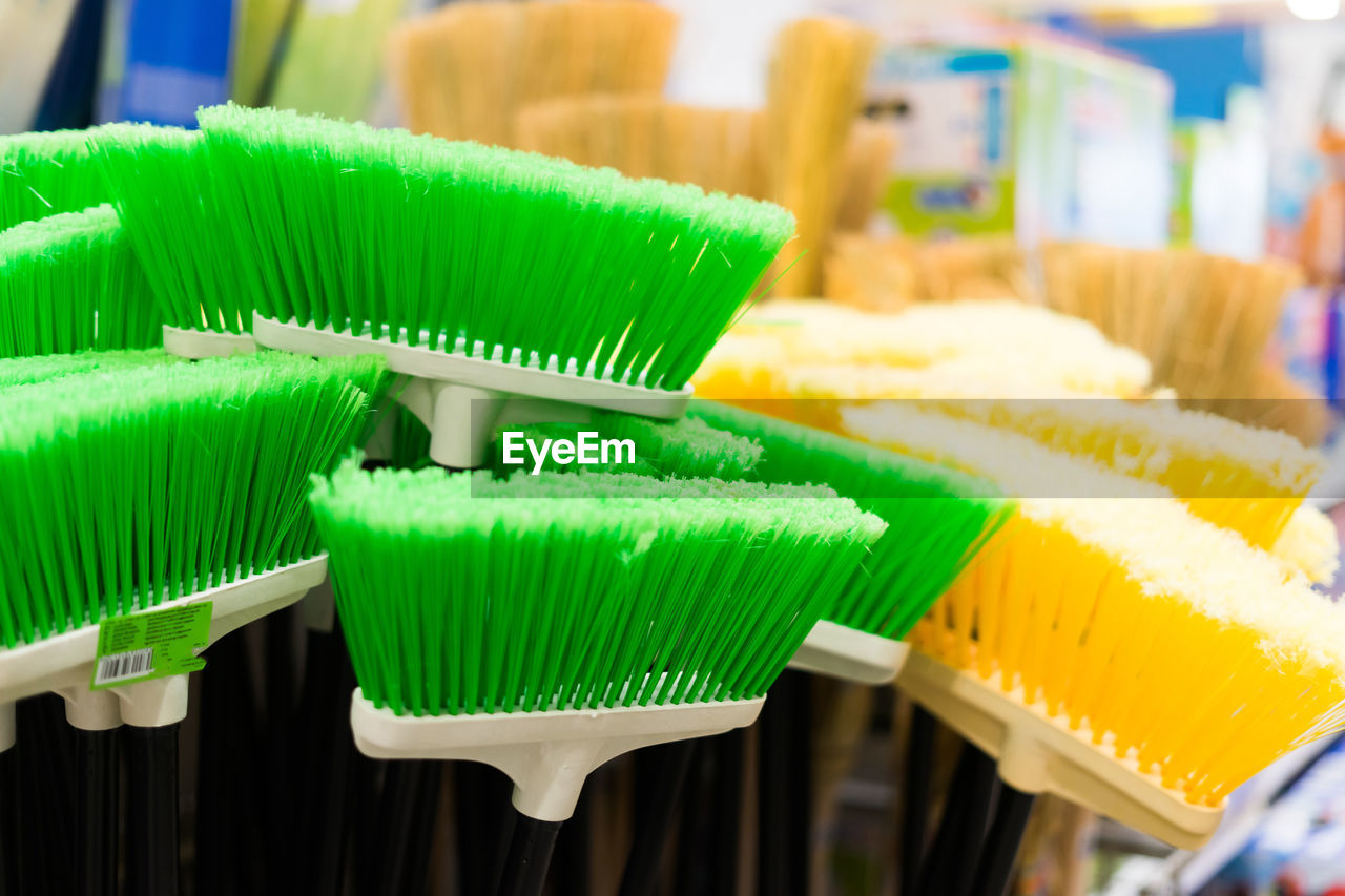 green, hygiene, cleaning equipment, brush, broom, cleaning, no people, multi colored, indoors, business, close-up, yellow, food, focus on foreground