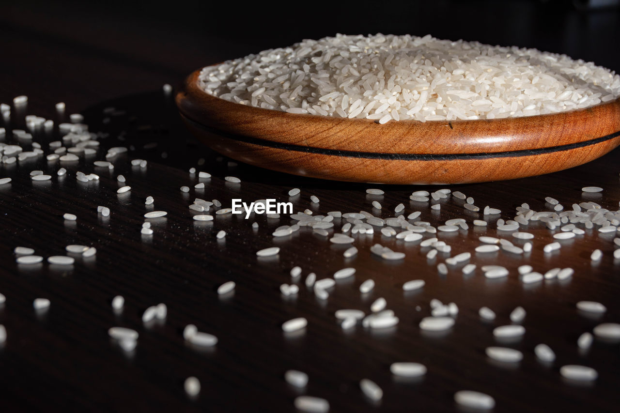 White rice on wooden bowl.