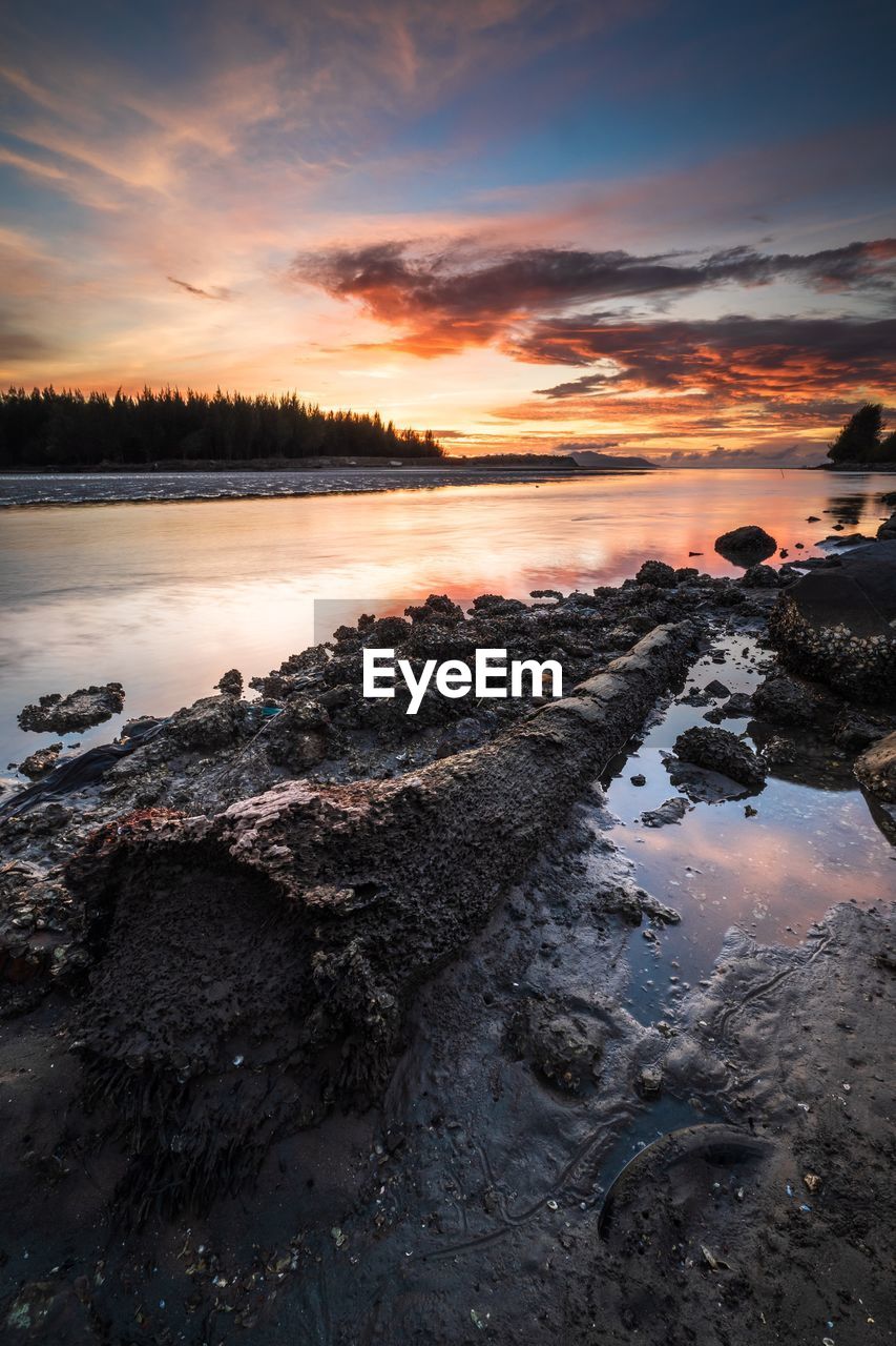 Scenic view of sea against sky during sunset