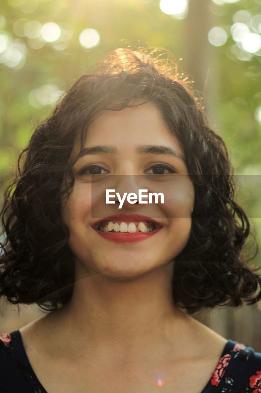 Portrait of smiling young woman