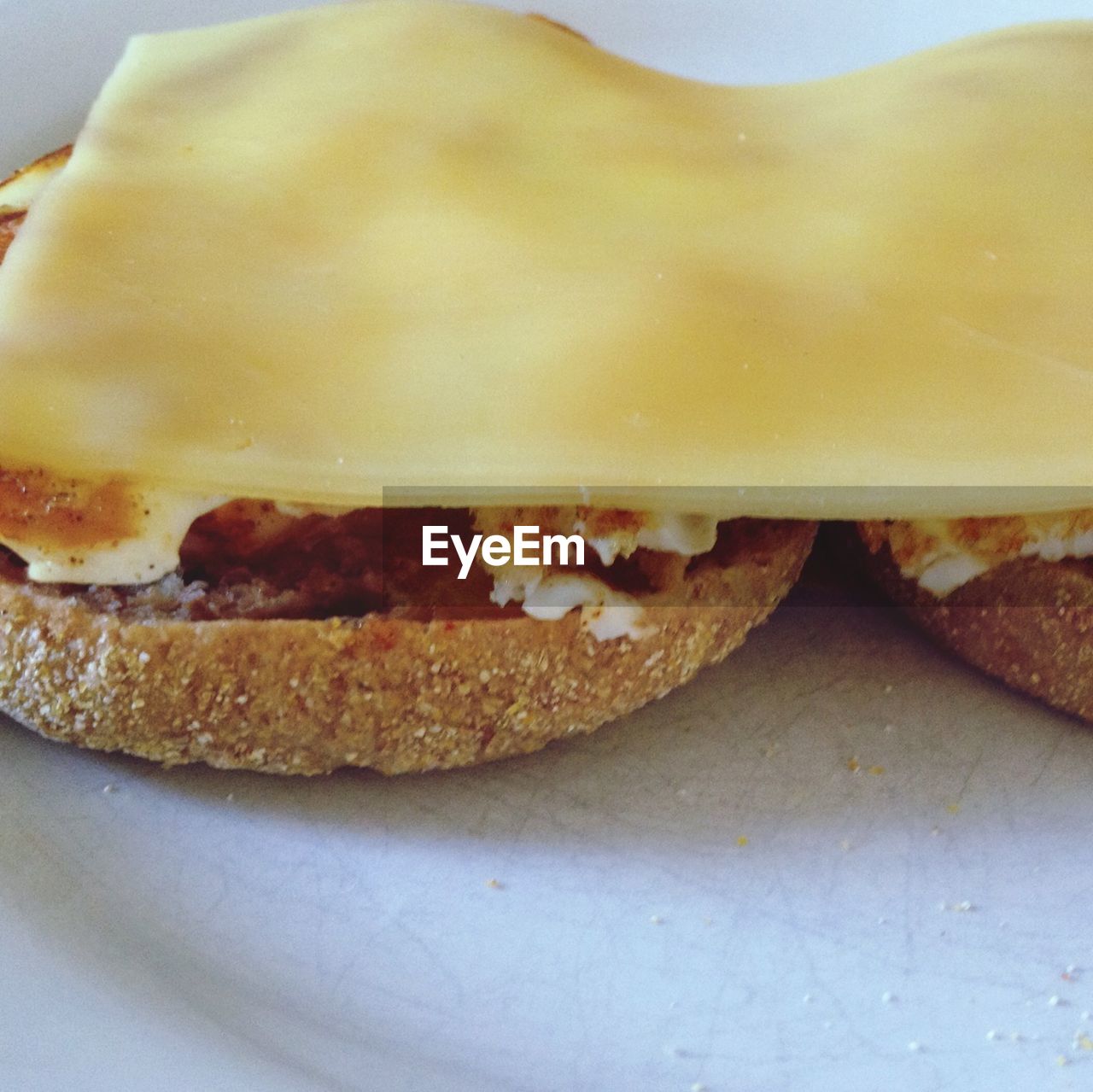 Close-up of cheese on sandwich served in plate