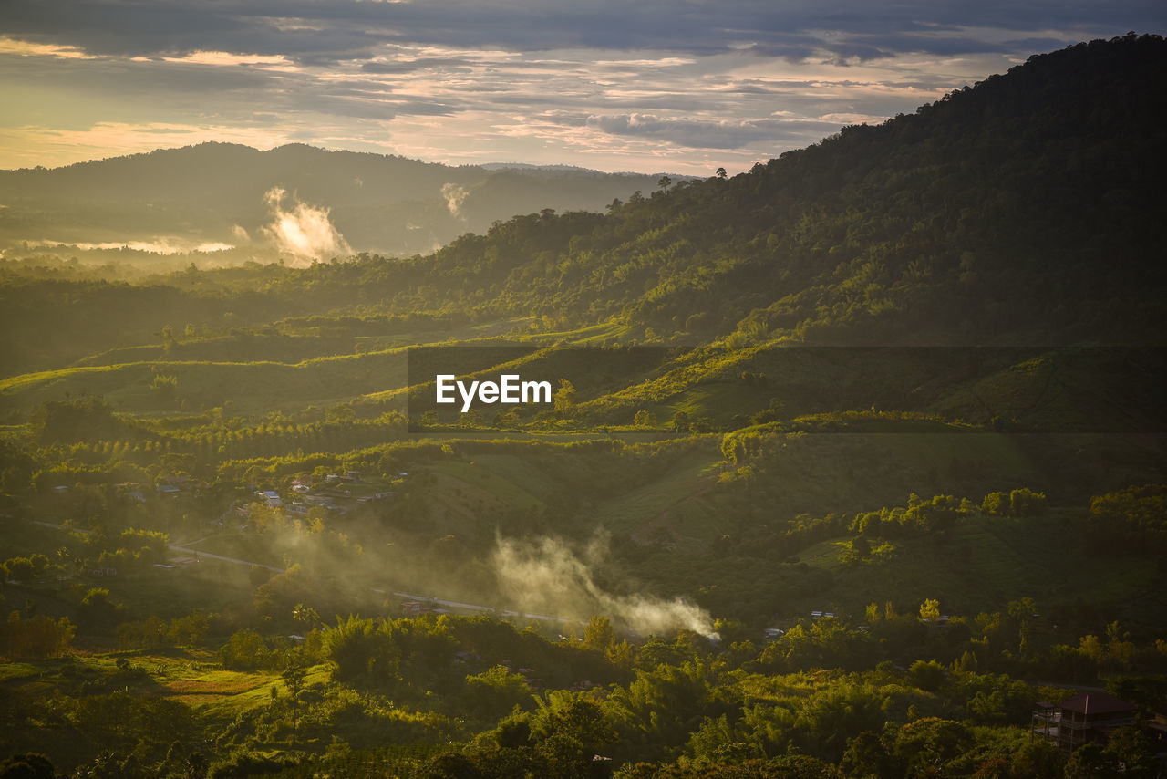 Scenic view of mountains against sky during sunset