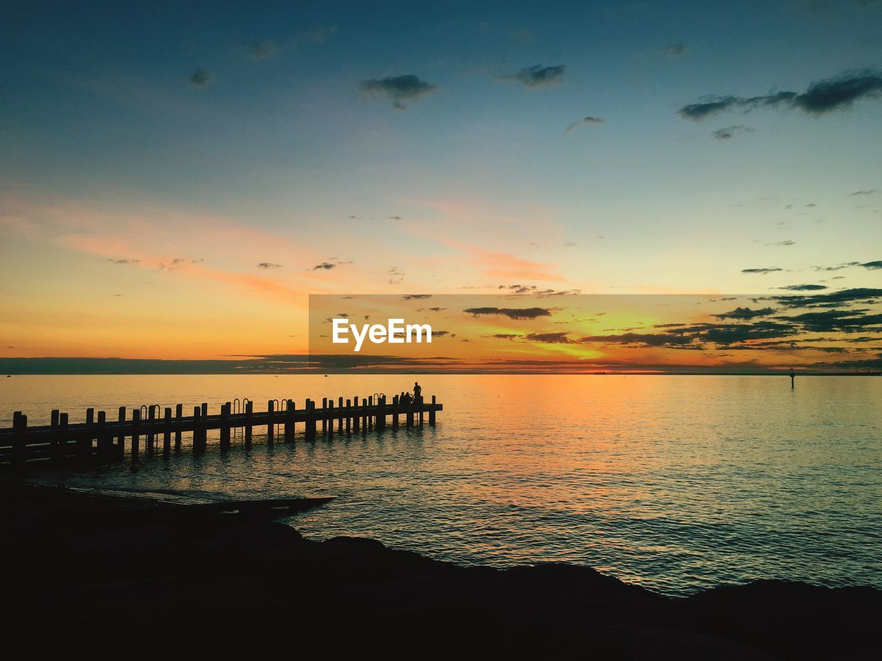 Scenic view of sunset over sea