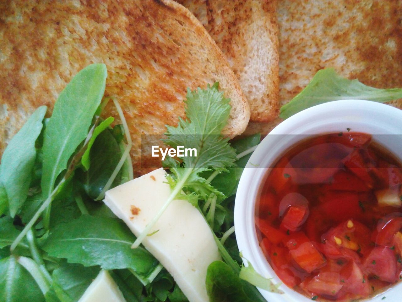 HIGH ANGLE VIEW OF SOUP WITH RICE IN BOWL