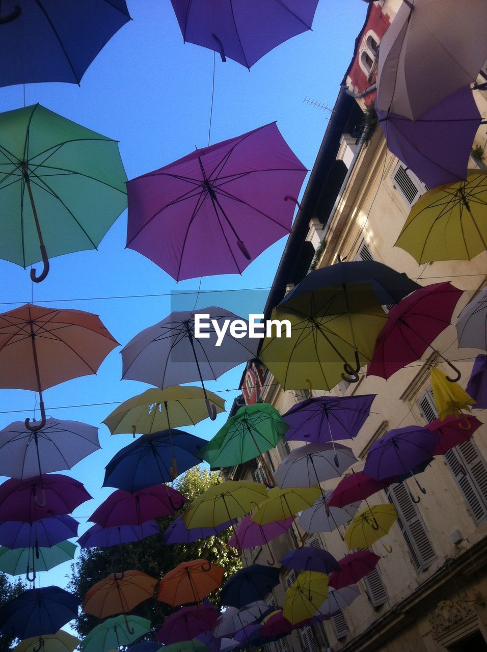 LOW ANGLE VIEW OF COLORFUL BUILT STRUCTURES