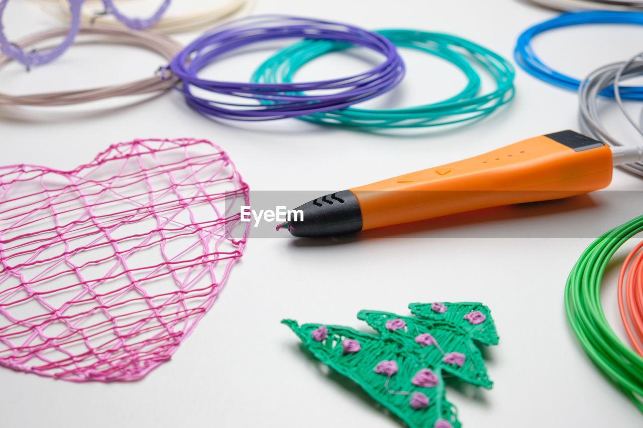 3d pen. colored plastic wire filament. artwork, robotics. steam, stem education. modern technologies