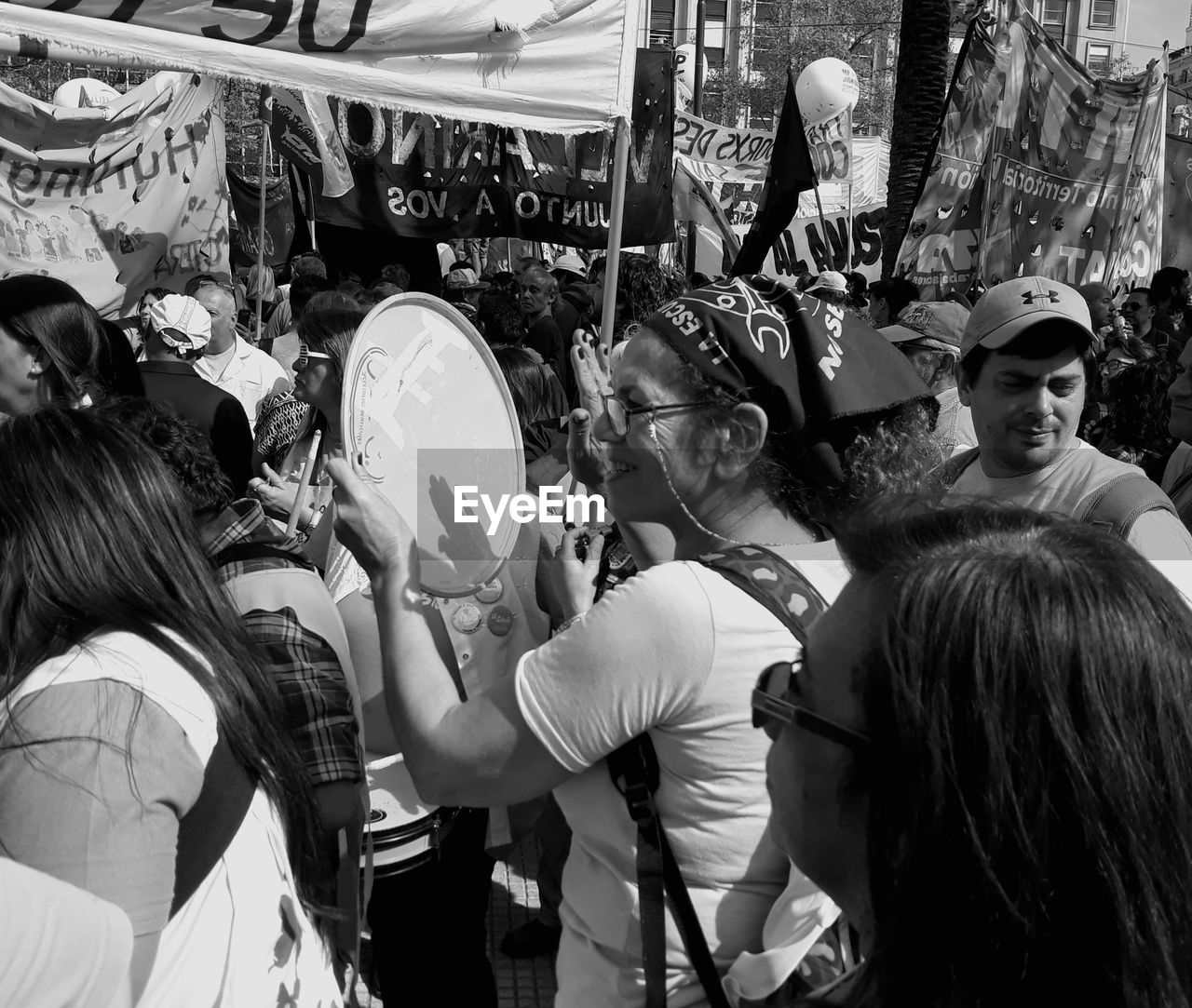 GROUP OF PEOPLE IN MARKET