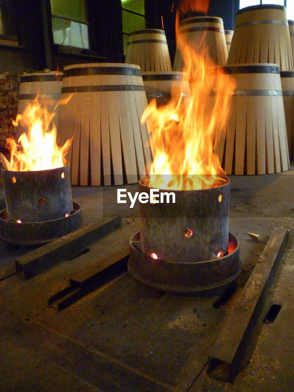 CLOSE-UP OF FIRE BURNING IN CANDLES