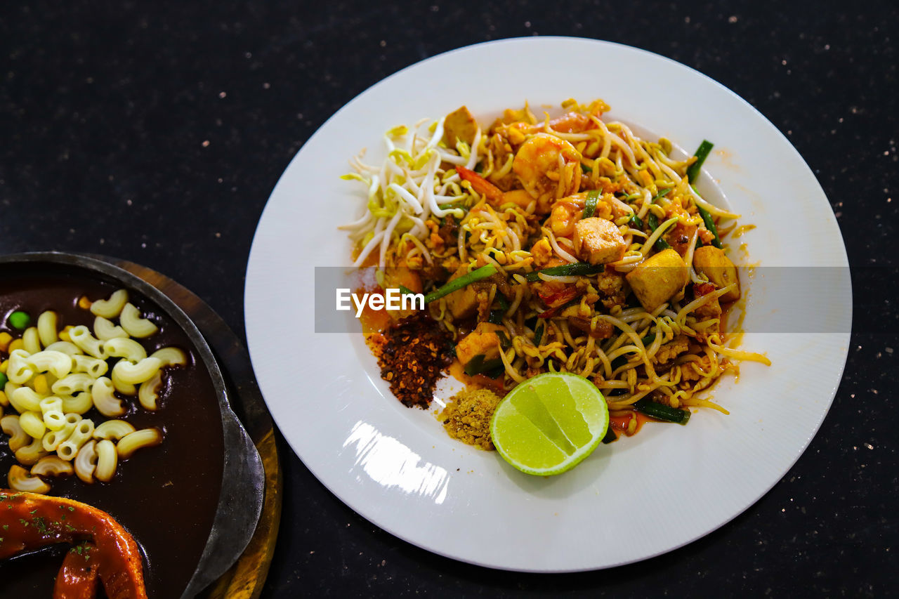 Thaifood,fresh shrimp pat thai on the dining table