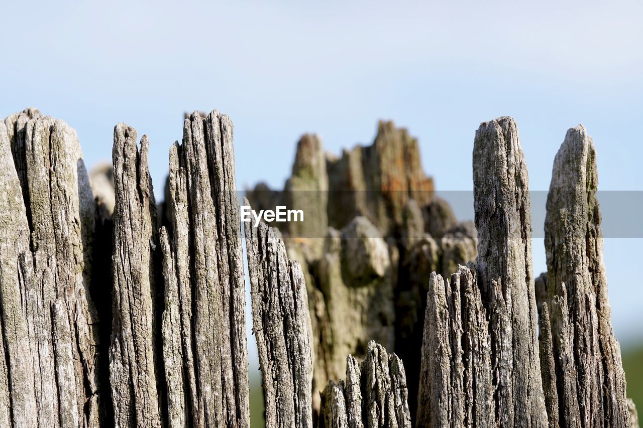 Panoramic shot of wooden post against sky