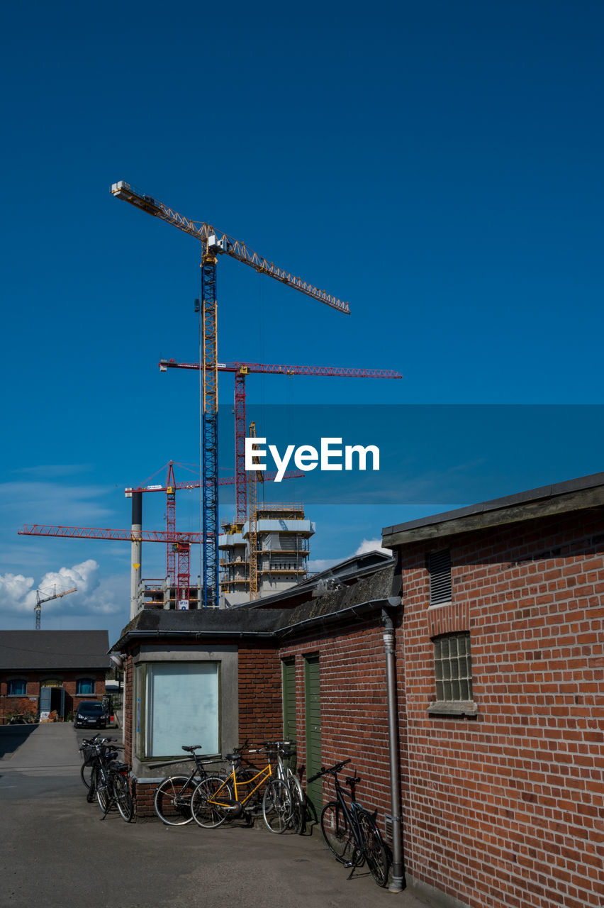 The old southern harbor in aarhus an construction cranes