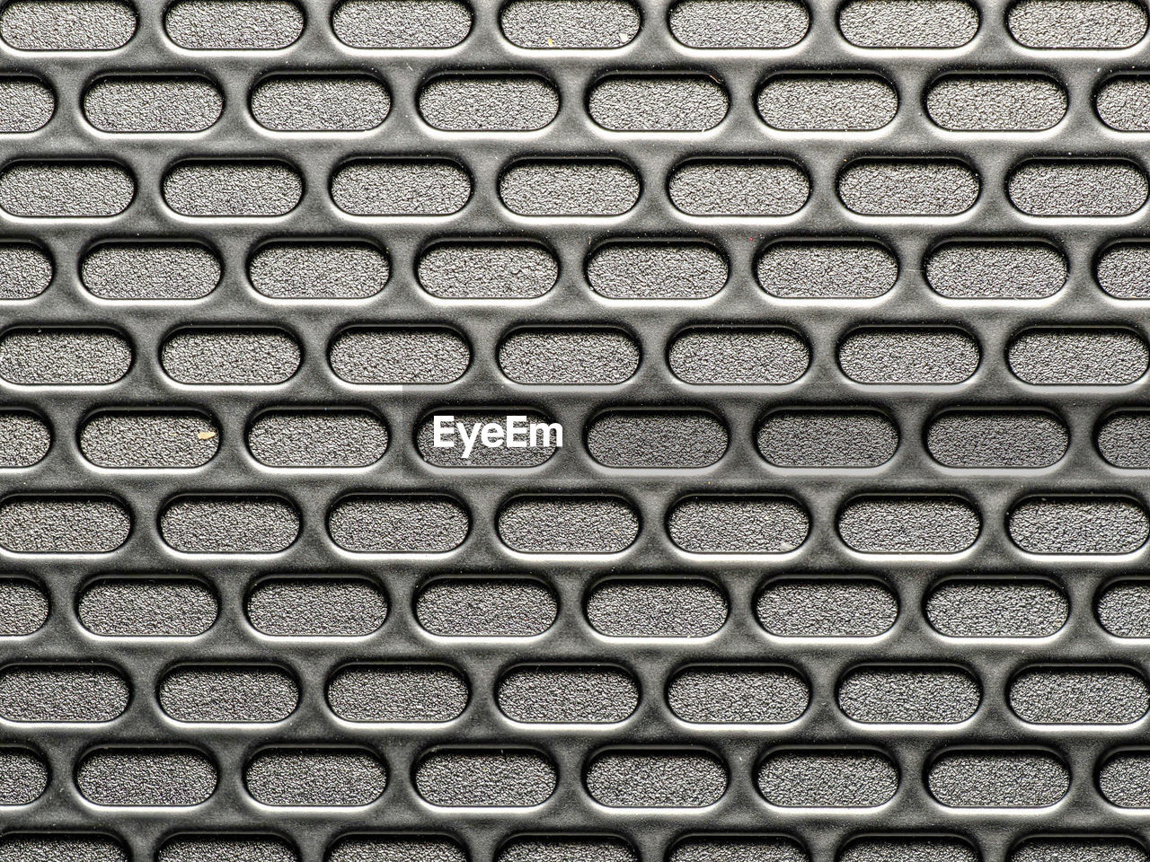 Close up shot of a metal grid pattern