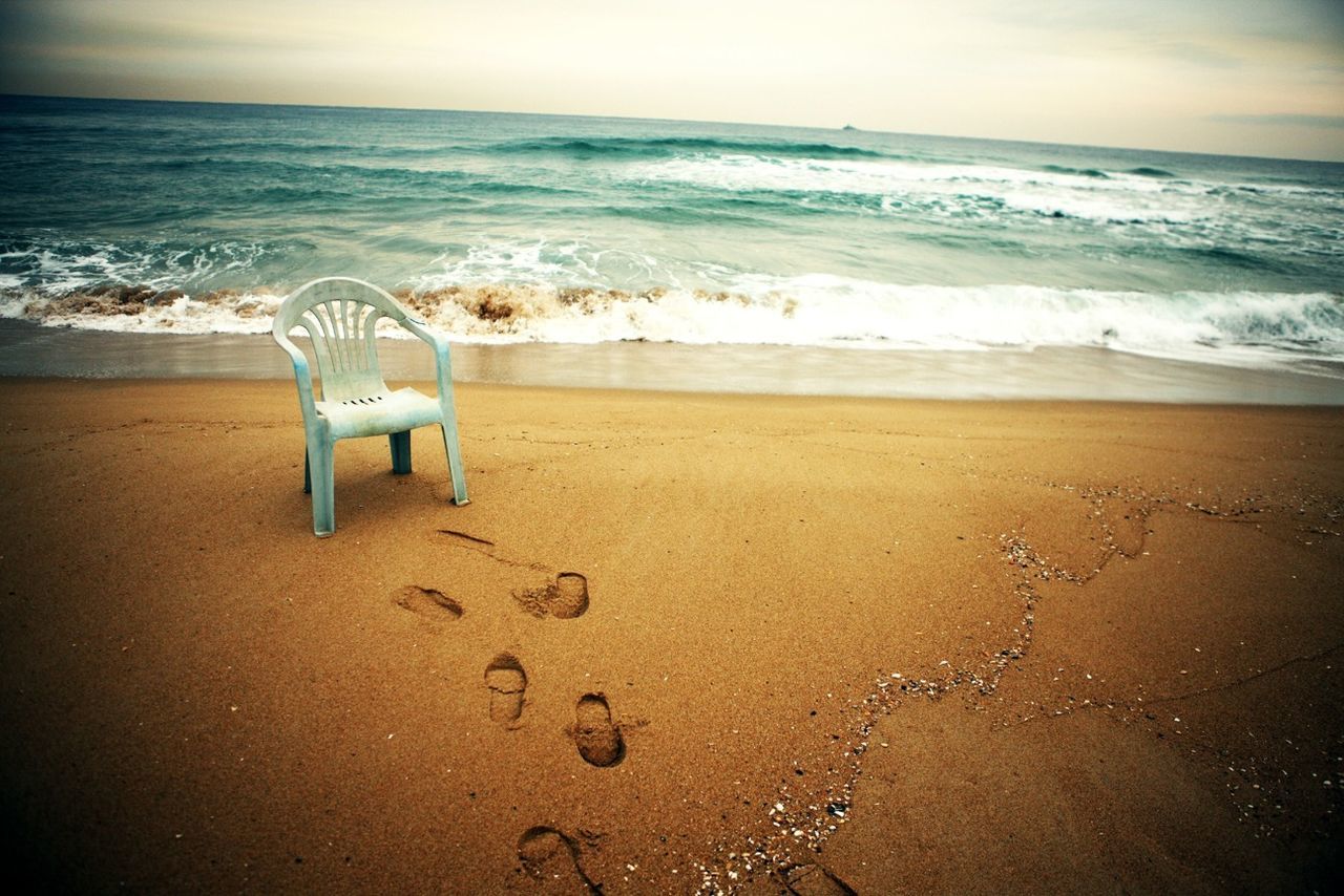 Abandoned chair at beach