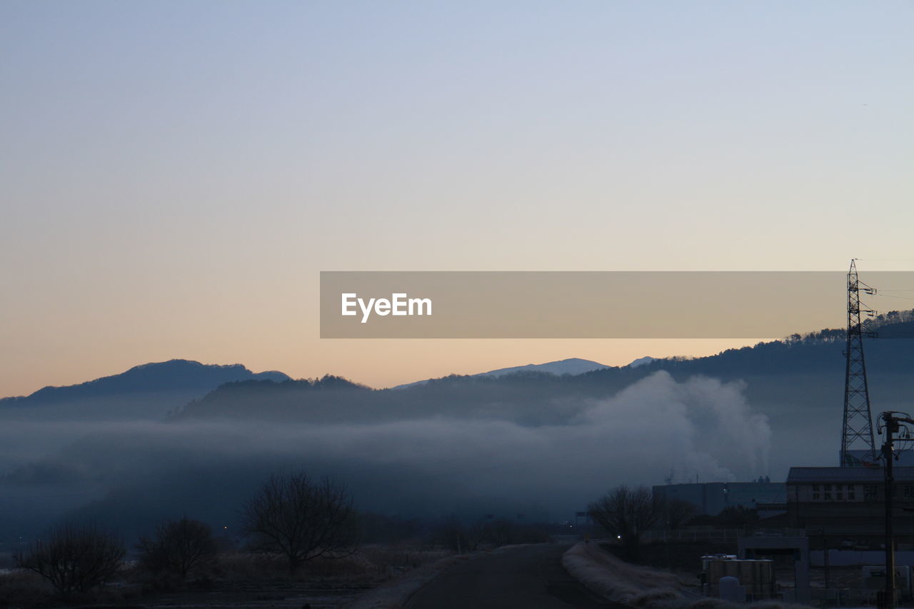 VIEW OF MOUNTAINS AGAINST CLEAR SKY