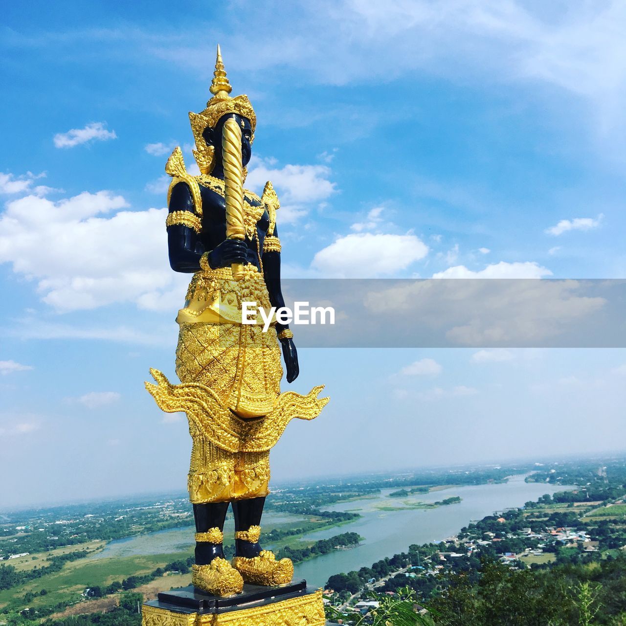 STATUE AGAINST SKY