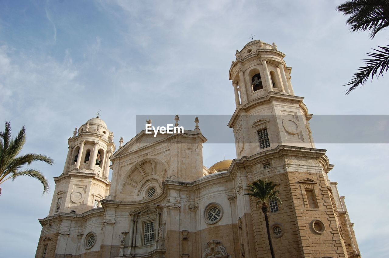 Low angle view of jerez de la frontera cathedral against sky during sunny day