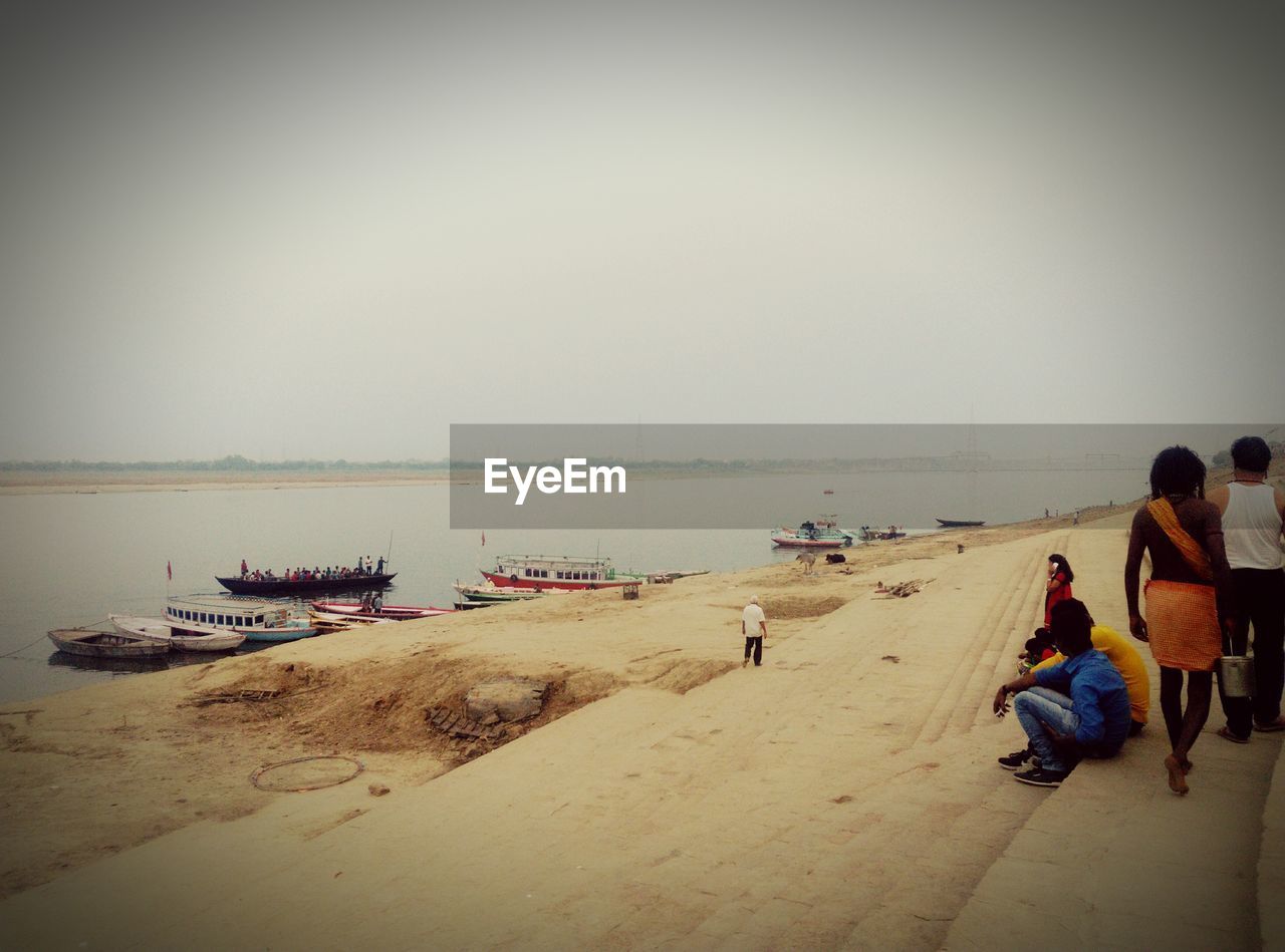 VIEW OF PEOPLE ON BEACH