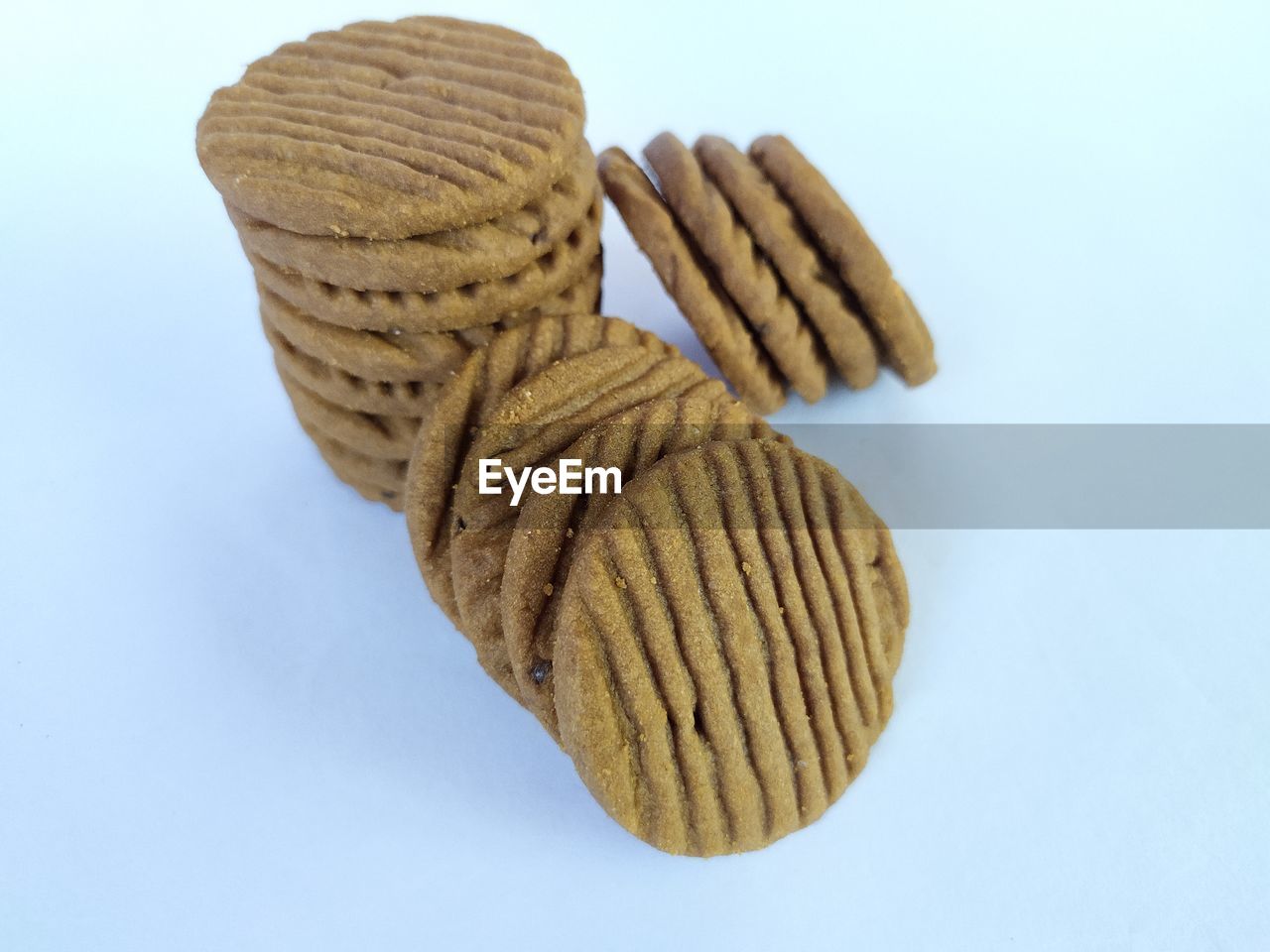 Round biscuits on white background.