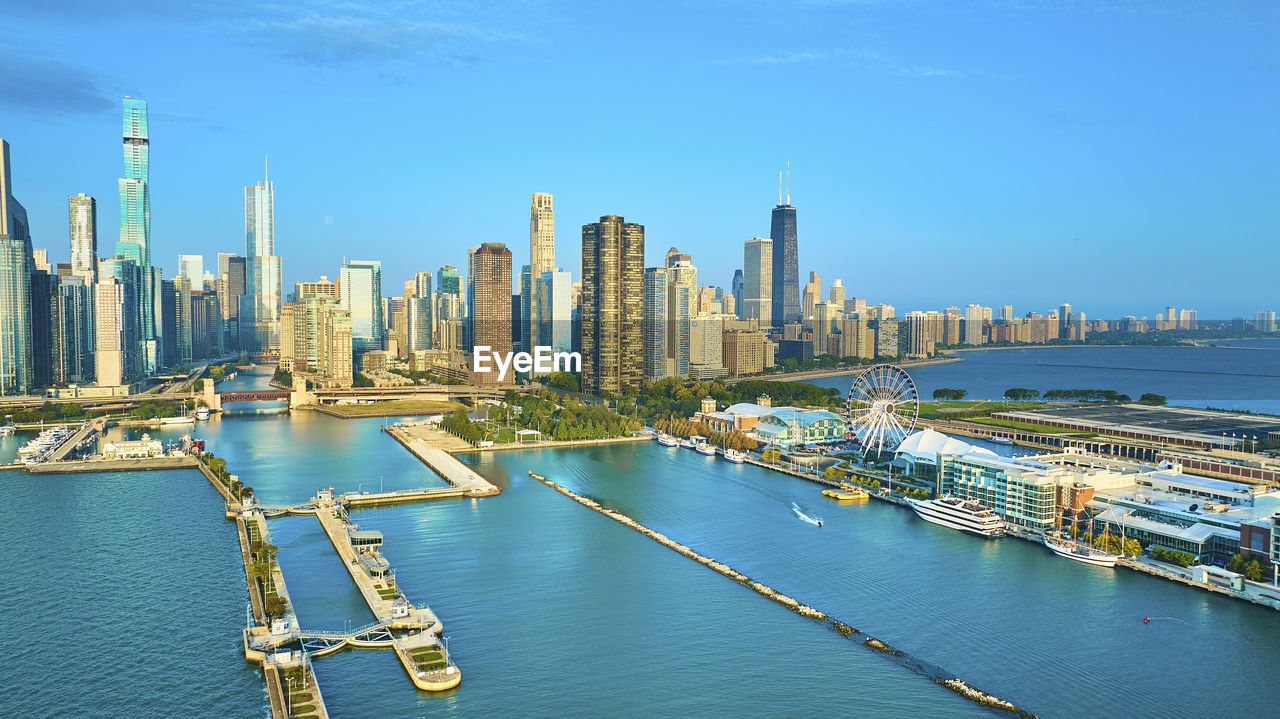 high angle view of cityscape against blue sky