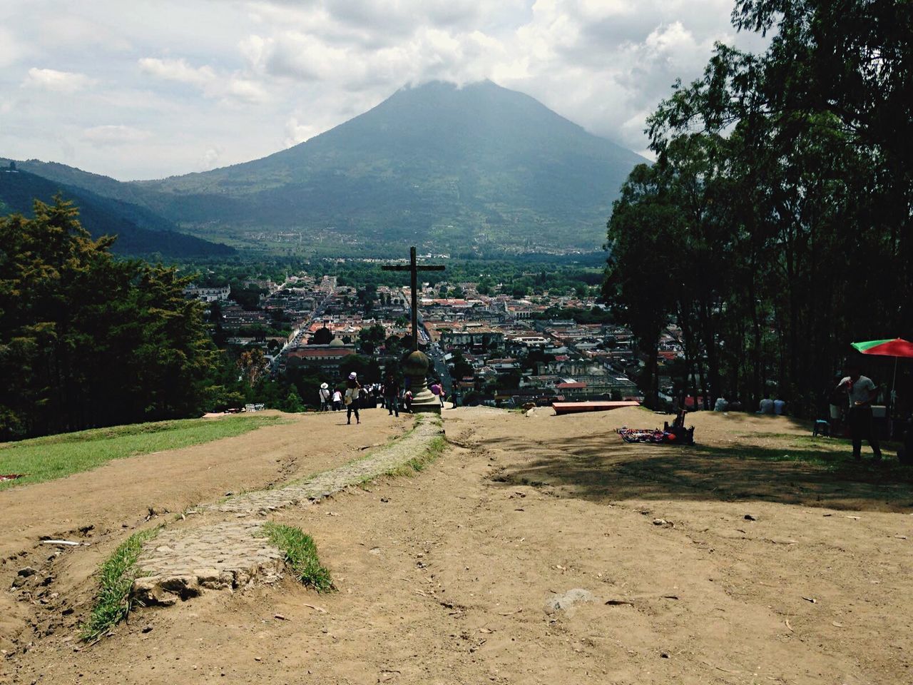 PEOPLE ON LANDSCAPE AGAINST SKY