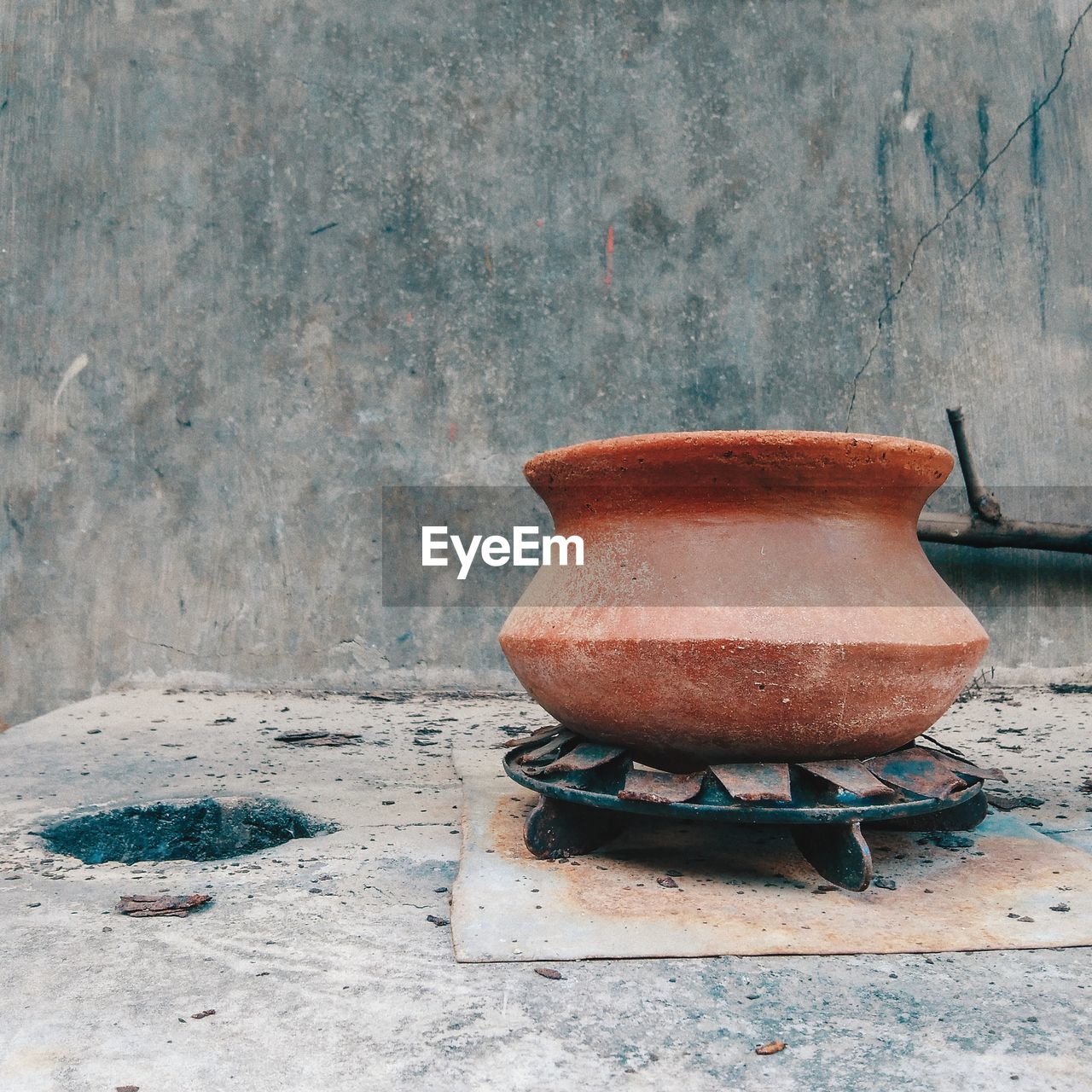 Old cooking pot on table