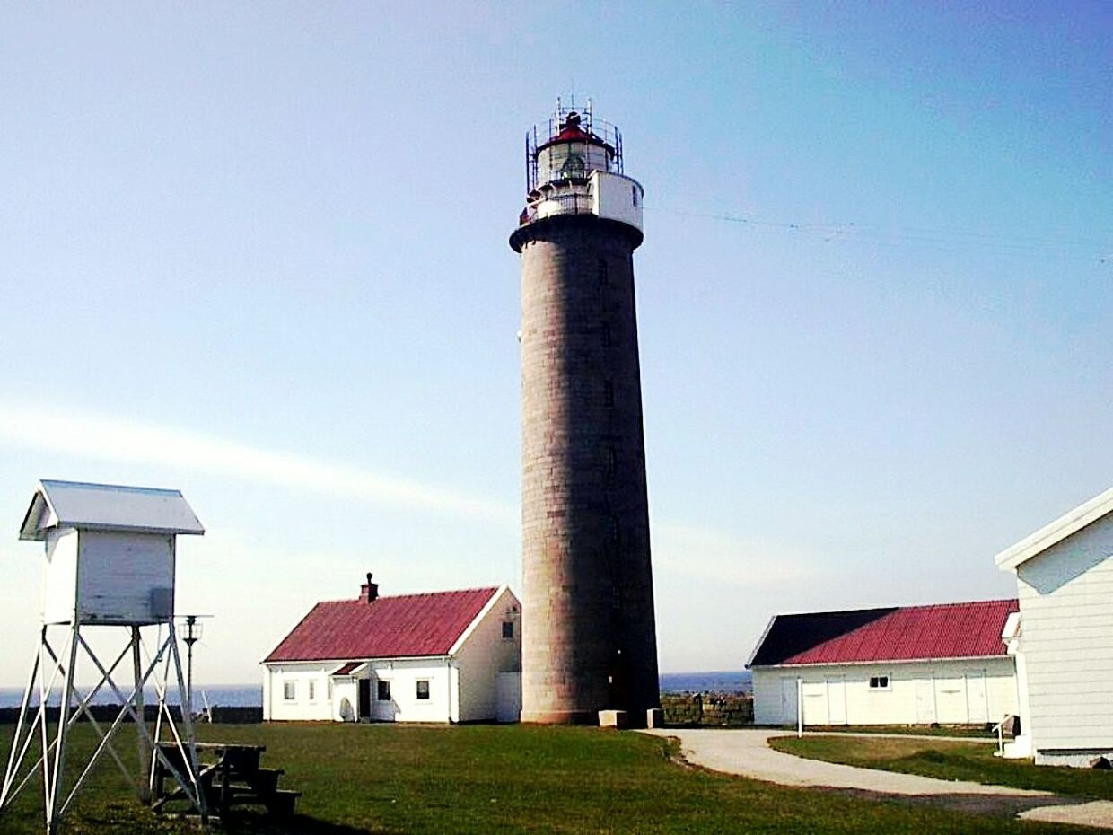 LIGHTHOUSE AGAINST SKY