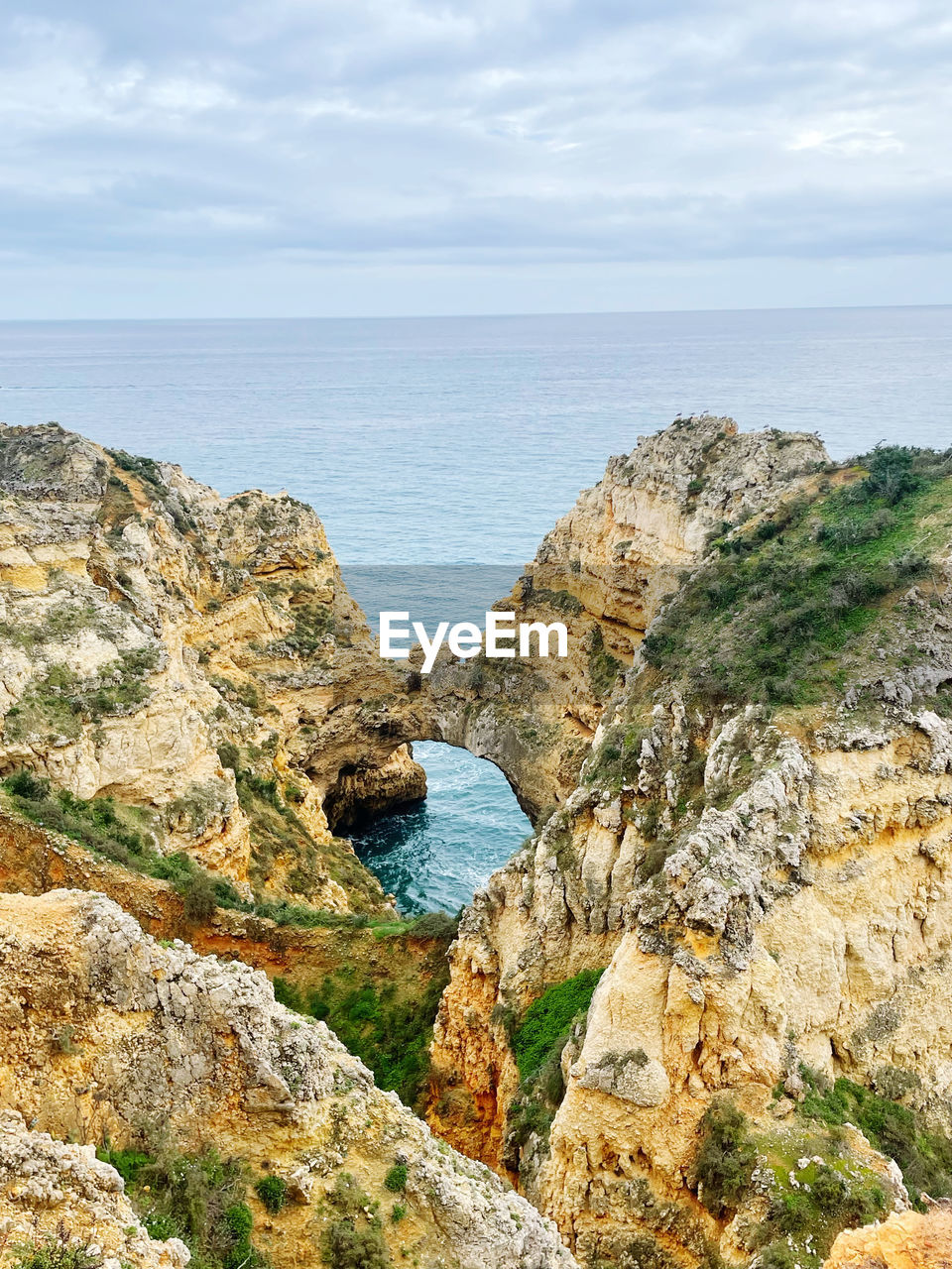 scenic view of sea against blue sky