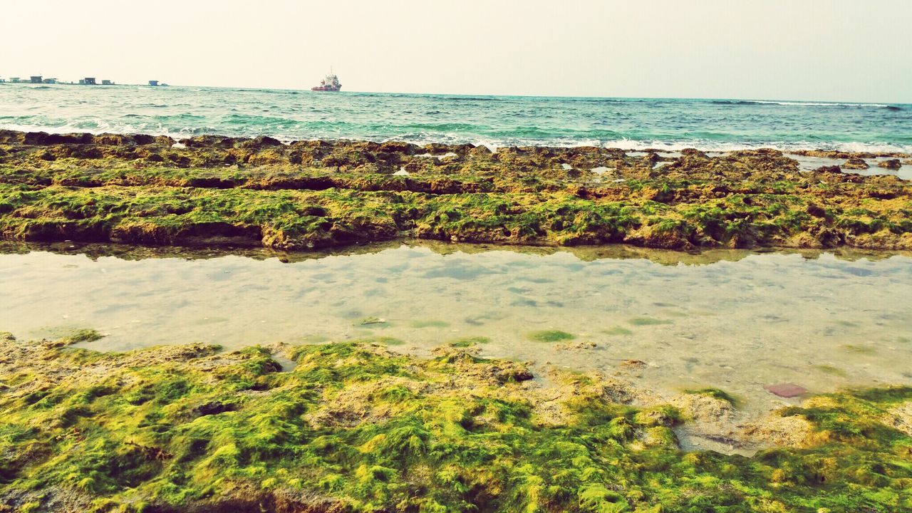 SCENIC VIEW OF SEASCAPE AGAINST SKY