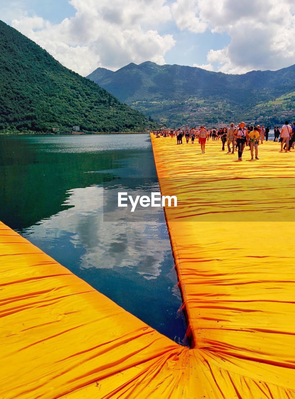 SCENIC VIEW OF LAKE AND MOUNTAINS