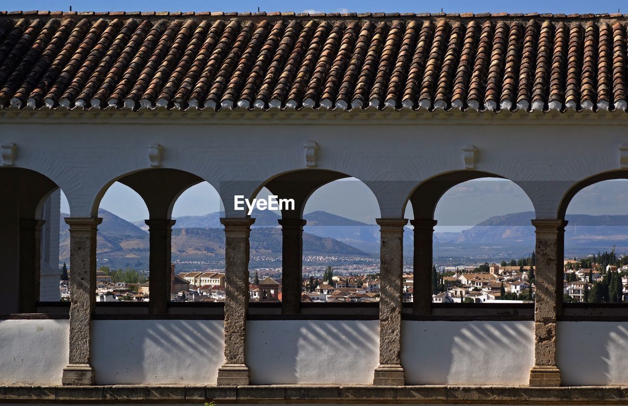 View of cityscape through arcade