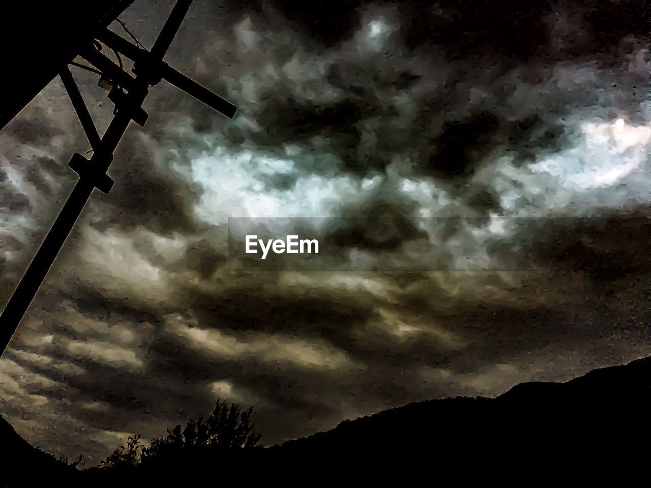 LOW ANGLE VIEW OF POWER LINES AGAINST SKY