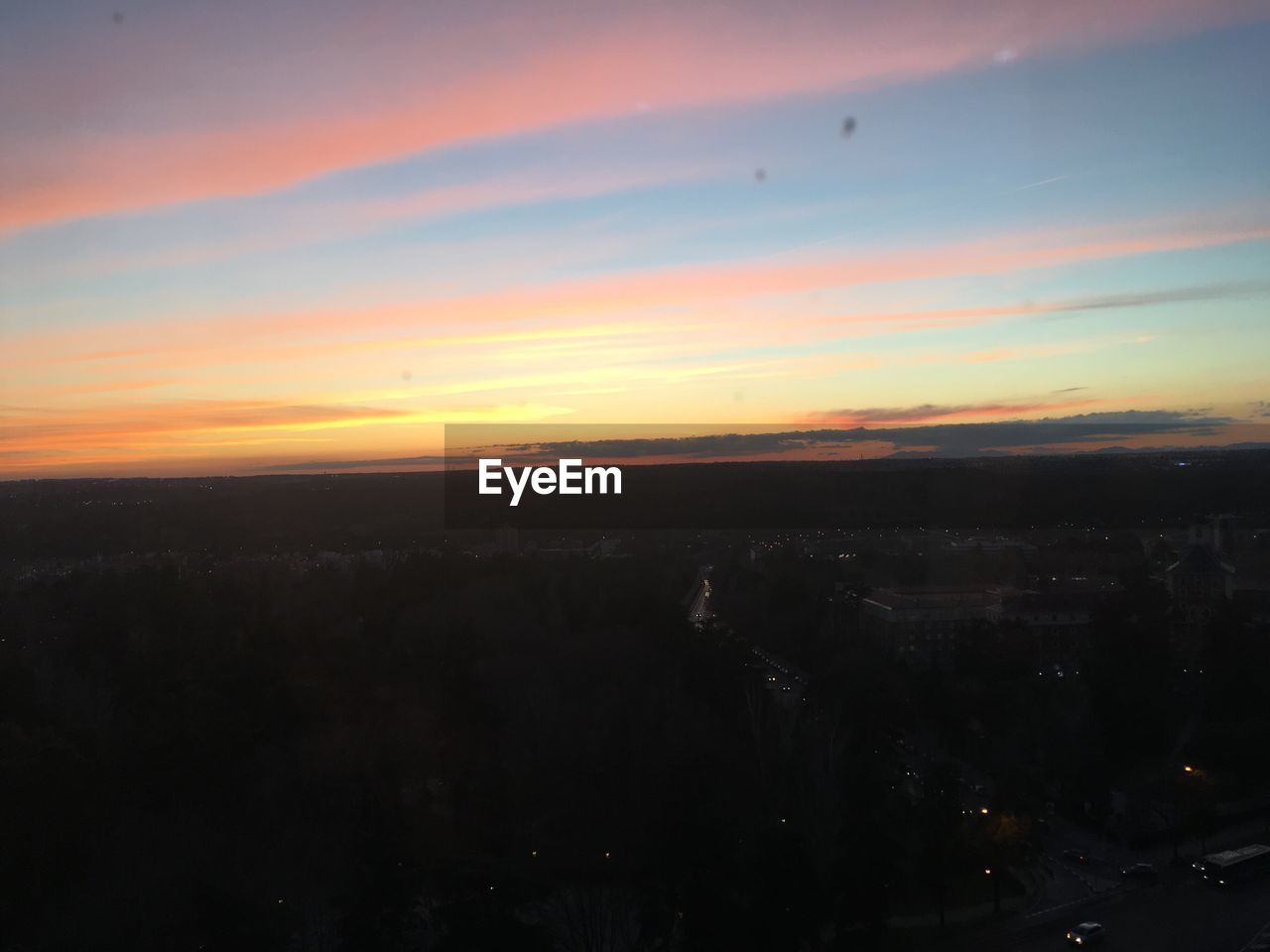 SCENIC VIEW OF LANDSCAPE AGAINST SKY AT SUNSET