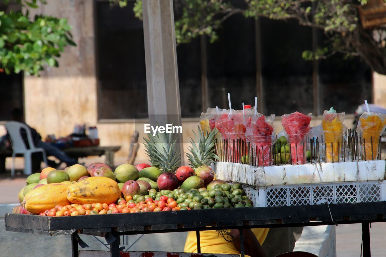 Food for sale at market on street