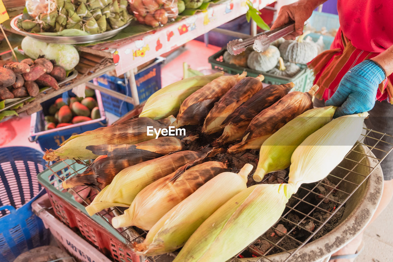 HIGH ANGLE VIEW OF FRUITS AT MARKET STALL