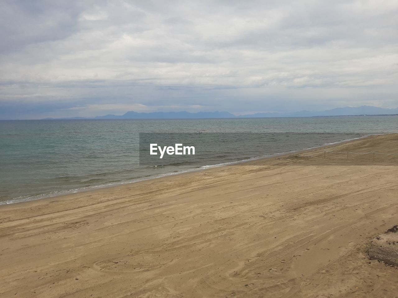 VIEW OF BEACH AGAINST SKY