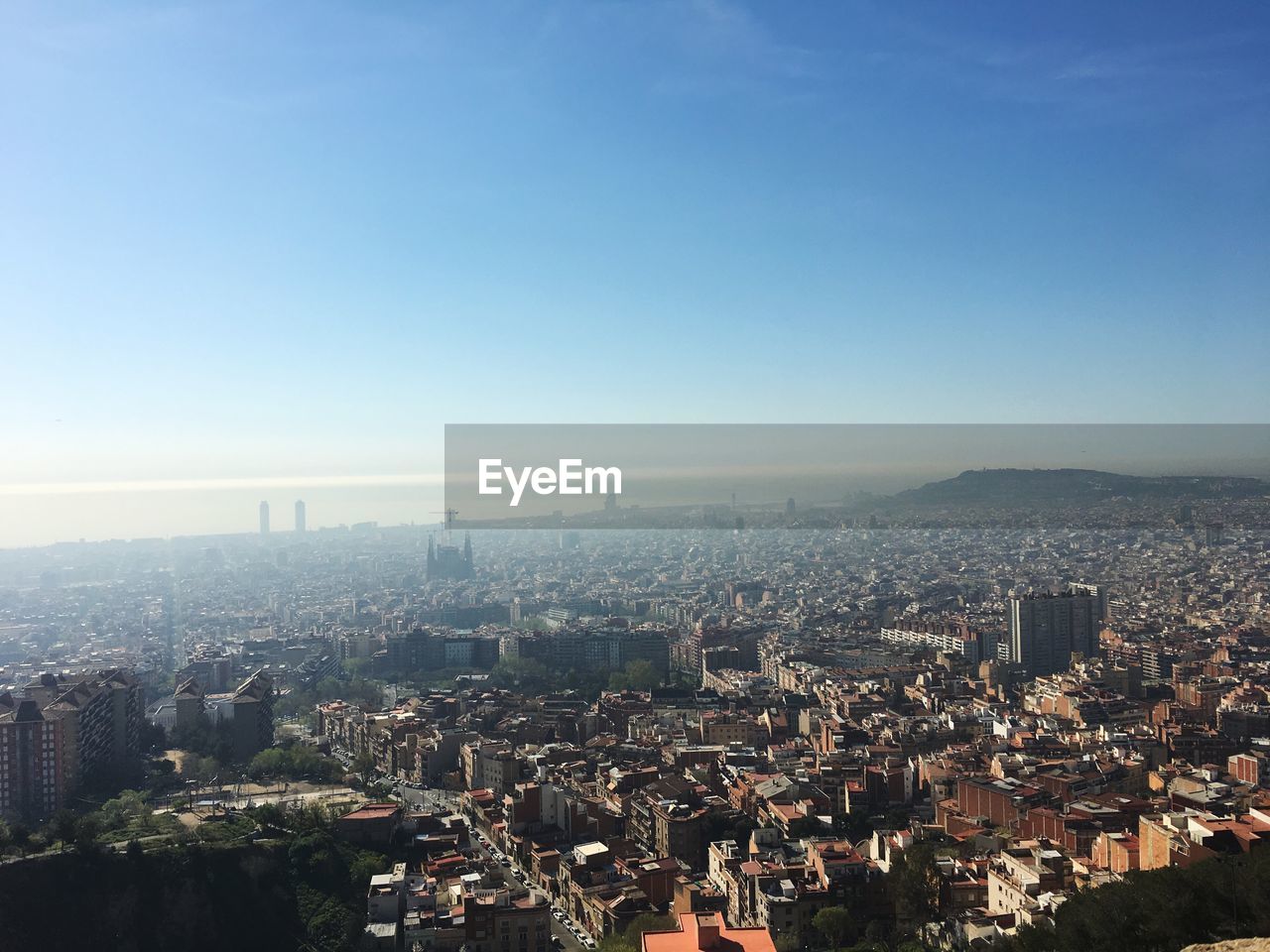 Aerial view of cityscape against clear sky