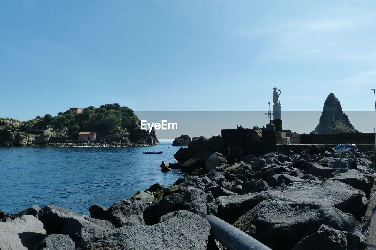 Scenic view of sea against clear sky